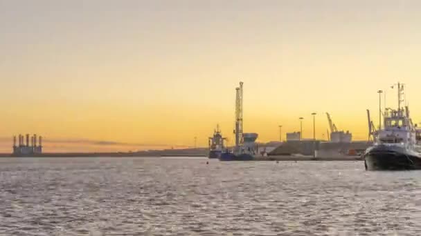 Industrial Crane Working Harbour Loading Ship Sunset Timelapse — Stock video