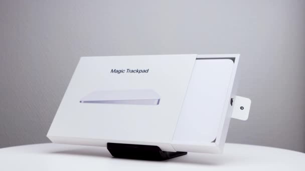 Half Opened Rotating White Package Box Showing Mac Magic Trackpad — Stock Video