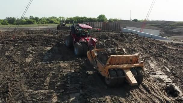 Aerial Tractor Pulling Trailer Trolley Small Hill Rural Construction Site — 비디오