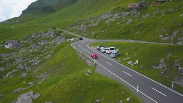 Vintage Red Convertible Car Racing Scenic Klausen Pass Aerial — Stock video