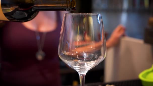 Attractive Female Bartender Casually Pours Red Wine Stemmed Wine Glass — ストック動画