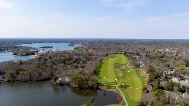 Huge Golf Course Field Small Town Atlantic Ocean Aerial Pan — Vídeo de Stock