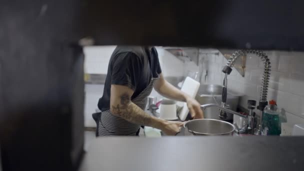 Male Chef Works Restaurant Kitchen Slomo Hole Wall — Stok video