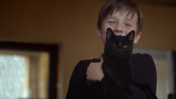 Portrait Laughing Boy Black Cat His Arms Copy Space — Video Stock