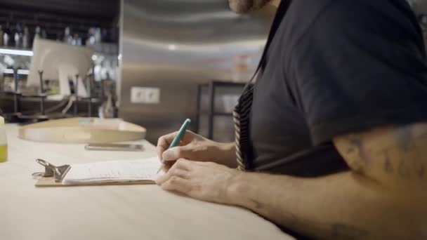 Close Side View Male Chef Writing Pad Restaurant Kitchen — Stok video