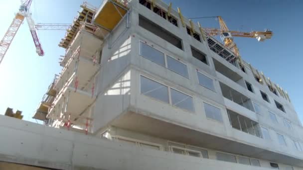 Looking Exterior Unfinished Building Erected Tower Crane Construction Site Low — Video