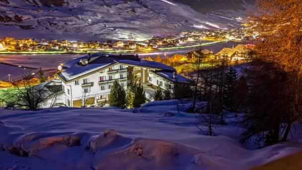 Time Lapse Shot Snowy Alps Mountains Valley Lighting Village Evening — Stockvideo