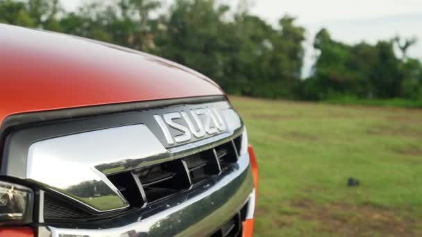 Malaysia- March 13, 2022: Private Pickup car in dark orange color. Isuzu D-Max truck enamel inscription on the bumper. a car that is suitable for the mobility of mining and plantation activities