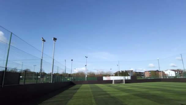 View Empty Proturf Football Pitch Goals Ruislip Pan Right Sunny — Video Stock