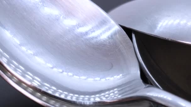 Macro Shot Steel Spoon Black Bacground Rotating Motion Close View — Stock Video