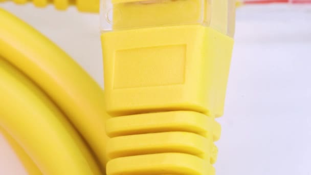 Close View Yellow Ethernet Cable Rotating White Surface Close View — Stok video