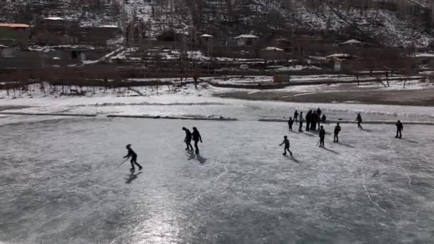 Many People Frozen Lake Ice Skate Cinematic Drone Shot Made — Stock Video