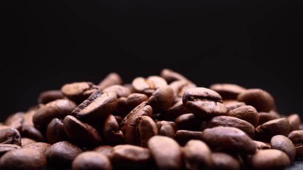 Heap High Quality Roasted Coffee Beans Isolated Black Background Rotating — Stockvideo