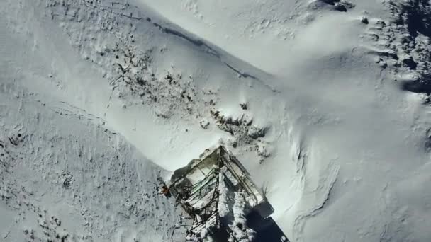 Aerial Top Electric Transmission Tower Electricity Pylon Covered Snow Storm — Stock Video