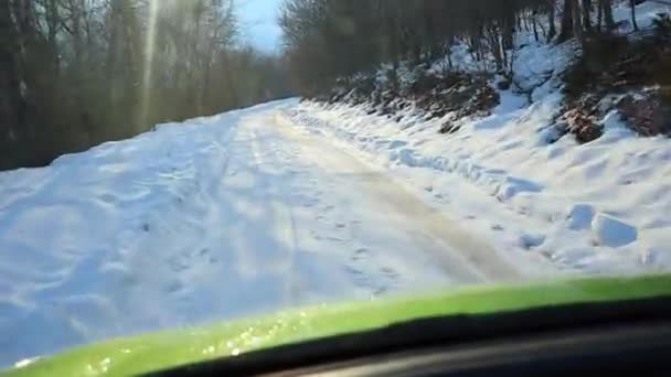 Car Driving Fast Snow Ice Slippery Covered Narrowed Mountains Road — Stockvideo