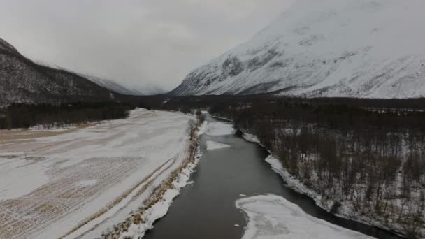 Flying River Snow Covered Valley Forest Agriculture Fields Drone Shot — Stock video