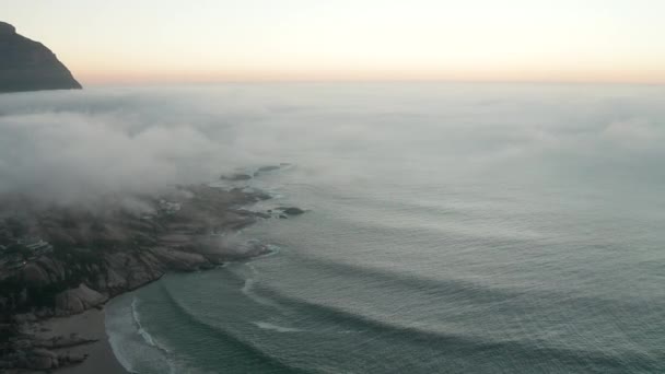 Foggy Sunset By The Coast Of Llandudno, Cape Town In South Africa - aerial shot