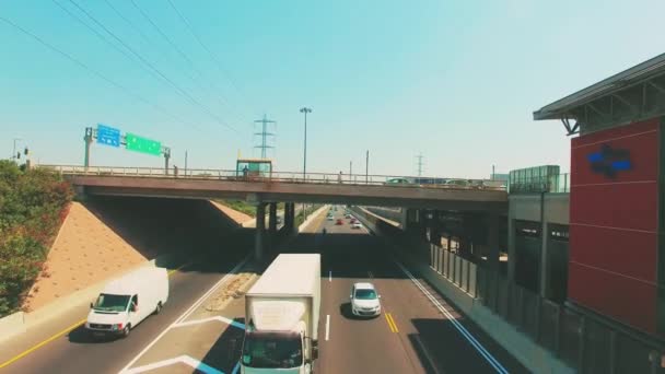 Pullback Aerial Cars Passing Camera — Video
