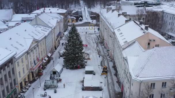 Drone Shot Christmas Tree Tartus Square Tractor Pushes Snow — стоковое видео