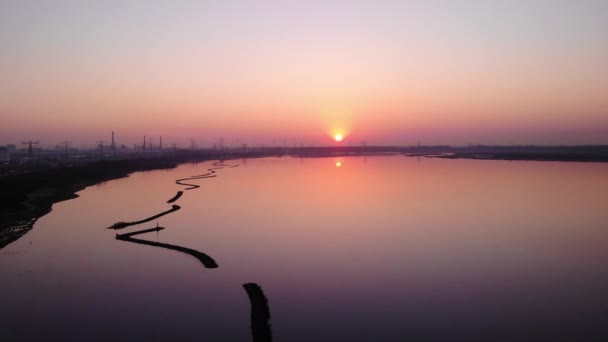 Aerial Calm Waterway Reflected Orange Sunset Next Silhouetted View Maasvlakte — Vídeos de Stock