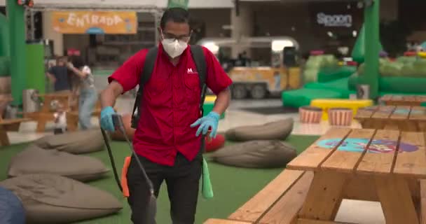 Man Cleaning Inflatables Sprayer Wipes Disinfection Covid Clean Tables — Stok video