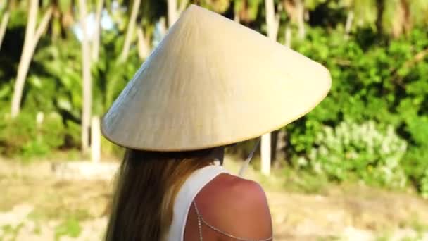 Cute Woman Conical Hat Tropical Forest Smiles Sunshine Close View — Video