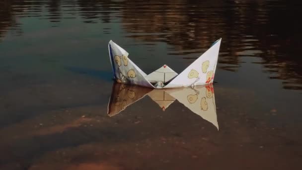 White Paper Boat Floats Surface Lake Water Waves Close — Stock videók