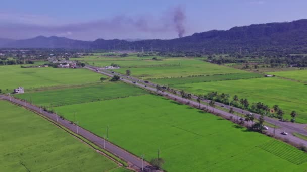 Aerial View Driving Cars Road Agricultural Fields Smoking Stacks Mountains — Stockvideo