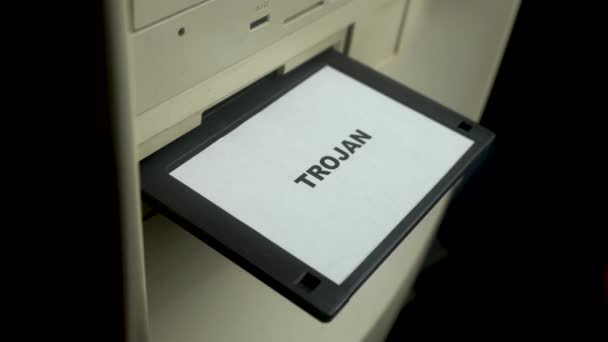 Floppy Disk Trojan Virus Hand Inserting Diskette Drive Close — стокове відео