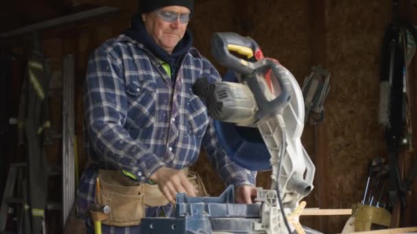 Construction Man Uses Table Saw Cut Board Measures Satisfied Final — Vídeo de stock