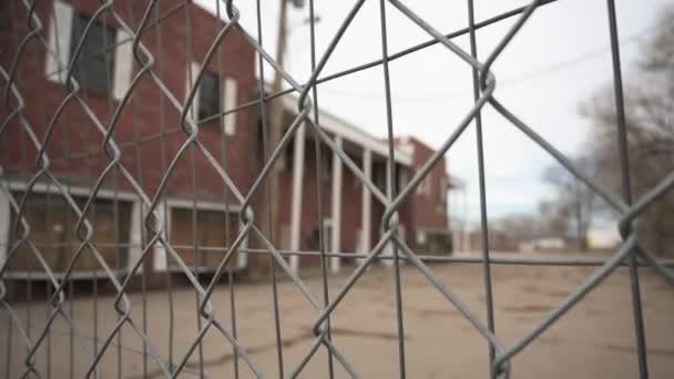 Looking Fence Abandoned School Pan Rack Focus — стоковое видео