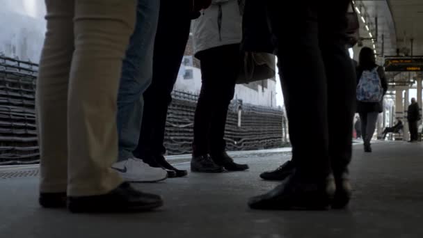 View Lower Half Legs Group Standing Station Platform Waiting Train — Stockvideo