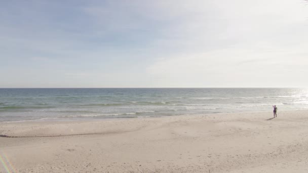 Woman Walking Far Away Camera Workout Big Empty Sand Beach — стоковое видео