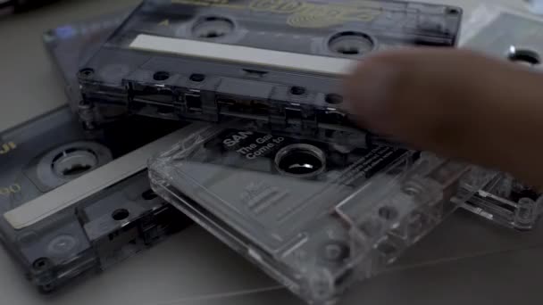 Pile Old Music Cassette Tapes Being Removed One One Close — Stock Video