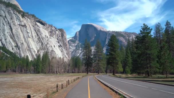 Static Wide Shot Showing Biking Trail Car Road Gigantic Mountain — Stock Video