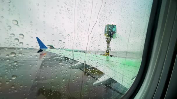 Window Seat Pov Airplane Has Wing Sprayed Green Icing Fluid — Stock video