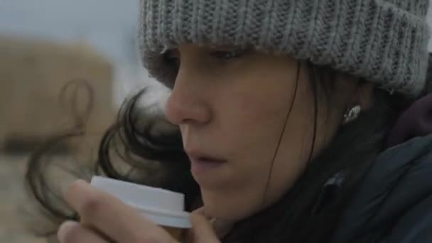 Close Shot Contemplative Womans Face Warming While Enjoying Coffee Outdoor — Vídeo de Stock