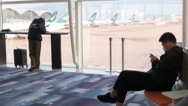 Passengers Use Smartphones While Waiting Board Flight Cathay Pacific Airline — Video