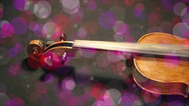 Bokeh Redemoinho Colorida Rodeia Violino — Vídeo de Stock