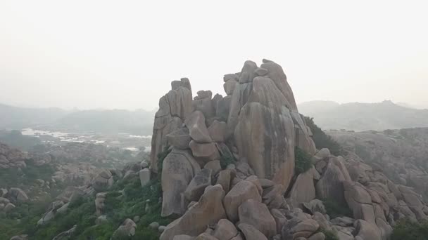 Orbiting Aerial Natural Rock Boulder Formation Foggy Hampi India — Vídeos de Stock
