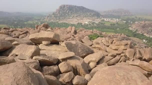 One Male Tourist Stands Massive Granite Boulder Hampi India — стоковое видео