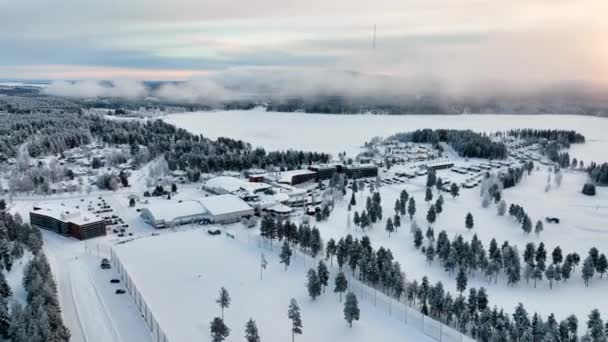 Aerial View Away Foggy Vuokatti Hill Winter Sunset Finland Pull — Wideo stockowe