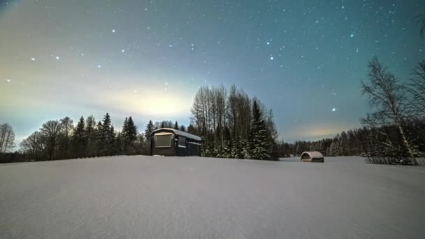 Wooden Cabin Snowy Landscape Starry Sky Night Time Lapse Wide — Stok video