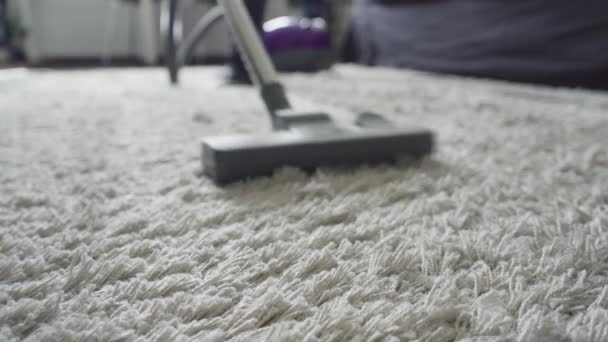 Man Vacuuming Carpet Housework — Stock video