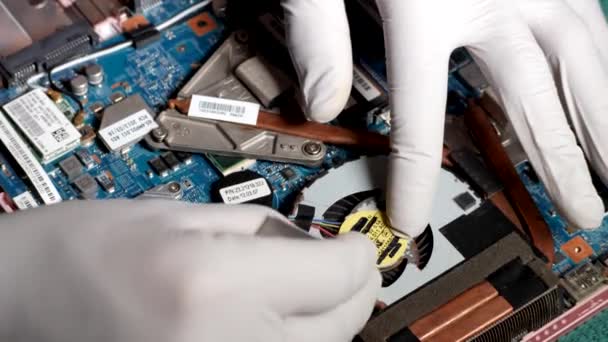 Latino Computer Technician Cleaning Laptop Processor Fan Tweezers Instead Compressed — Video Stock