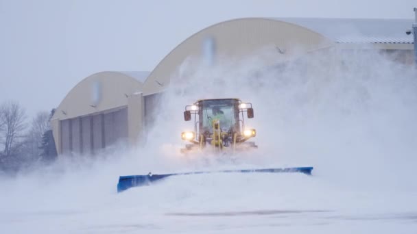 Snow Plow Tractor Clearing Thick Snow Heavy Blizzard Storm Slow — Stock Video