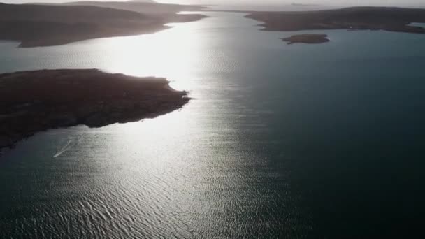 Picturesque Calm Sea Surrounded Small Islands Cliffs Silhouette Aerial — Stock Video
