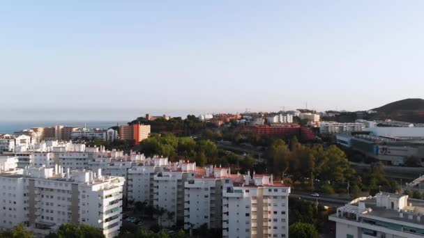 Backwards Flying Aerial Drone Shot Fuengirola Town Centre Buildings Sea — стоковое видео