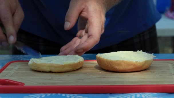 Caucasian Male Preparing Delicious Sandwich While Camping Nature — Stock video