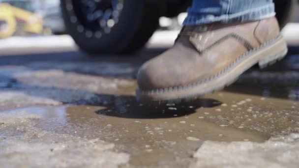 Close Man Rugged Work Boots Splashing Puddle While Getting Truck — Wideo stockowe